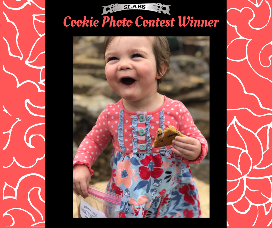 Slabs Lake City Chocolate Chip Cookie Contest winner Jay Alissa Duke with large chocolate chip cookie. #winner #slabsSC #lakeCitySC
