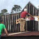 Slabs Lake City wood sign wood #BobbyJohnson #FleetwoodCovington putting sign up handles stainless sign #Slabs #Barbecue #pig #BBQ #pig #pork #slabsSC