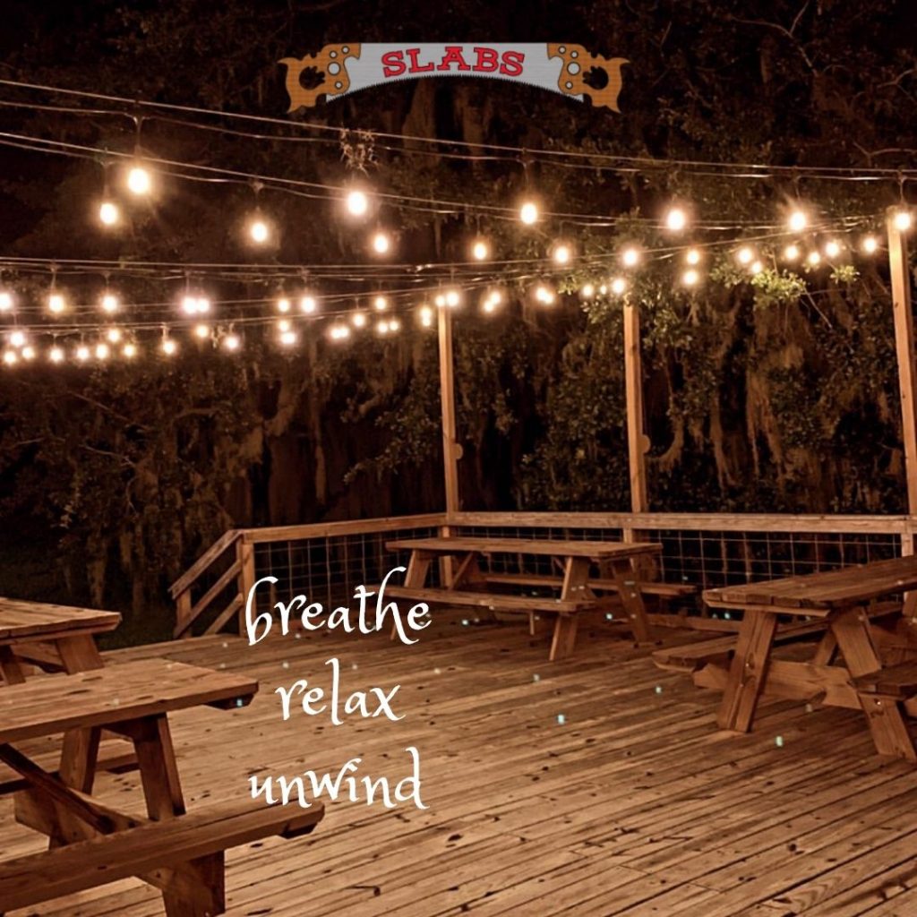 breathe-relax-unwind-peaceful-atmosphere-waterfront-deck-outdoor-seating-room-space-carefree-peace-calm-water-